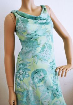 Teal, Blue , green, Green Dress, Summer ,Gown Size 5,6, dress Pretty light green and blue floral dress Dress size 5/6 Bust: 32'' Waist: 30'' Hips: 32'' Length from back of neck to bottom: 34'' 100% polyester Great condition- clean, no wear or marks Free shipping in the US NK571T Teal, Blue , green, Green Dress, Summer ,Gown Size 5,6, dress Green Green Dress, Green Dress Summer, Summer Gown, Summer Gowns, Velvet Kimono, Dress Pretty, Pretty Lights, Floral Blue Dress, Green And Blue