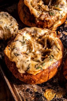 baked bread with cheese and herbs on top