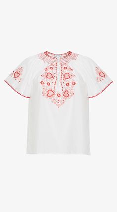 Embrace the 70s bohemian spirit with this romantic East-European-inspired style. Made from a breezy soft cotton voile, this blouse features delicate hearts and floral embroideries. The relaxed silhouette is perfect for pairing with denim shorts, high-rise jeans, or flowing skirts. 100% Cotton Silk Voile Blue embroidery detail Dry clean only 70s Bohemian, Embroidered Cotton Top, Luxury Sustainable, Slouchy Pants, Red Embroidery, Heart Crystal, Blue Embroidery, Necklace Heart, Flowing Skirt