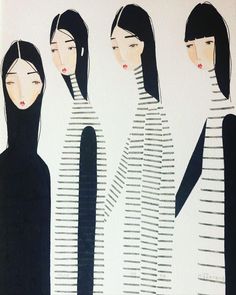 three women in black and white striped dresses