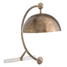 an old fashioned lamp with a white light on it's arm and a metal shade