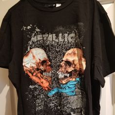 Metallica T-Shirt Nwot No Flaws Measurements: Across "25 Lenght From Shoulder '26 H&m Relaxed Fit T-shirt With Graphic Print, H&m Crew Neck T-shirt With Letter Print, H&m Relaxed Fit T-shirt For Streetwear, H&m Cotton Crew Neck T-shirt, H&m Cotton Streetwear T-shirt, H&m Cotton T-shirt For Streetwear, H&m Graphic Cotton T-shirt, Fan Merchandise Skull Print Short Sleeve Tops, H&m Cotton T-shirt With Graphic Print