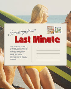 a man and woman sitting on top of a surfboard next to the ocean holding a sign