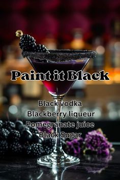 black vodka with blackberry liqueur in front of it and the words paint it black