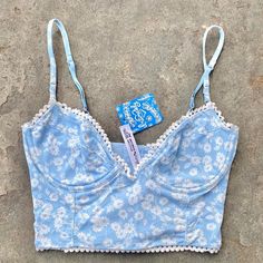 Features: All Over Mini Floral Print On A Baby Light Blue And White Colorway Underwired Cups (No Padding), Adjustable Straps. Scalloped Edges Add To The Overall Vibe Brand New With Tags Still On. Rrp $48. Tagged Size Xs. Summer Light Blue Bra-friendly Top, Summer Cotton Bra For Beach, Blue Fitted Tops With Underwire Support, Summer Beach Bra In Cotton, Summer Cotton Beach Bra, Summer Beach Cotton Bra, Blue Summer Bra For Vacation, Summer Light Blue Bra With Built-in Bra, Summer Light Blue Bra With Built-in Support