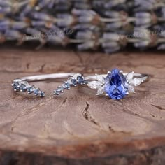 Unique Pear Shaped Blue Sapphire Engagement Ring Set Antique | Etsy Pear Shaped Engagement Rings Sapphire, Pear Shaped Sapphire Ring, Blue Wedding Rings Sapphire, Sapphire Diamond Wedding Jewelry, Blue Round Wedding Ring, Blue Wedding Jewelry With Accent Stones, Silver Sapphire Engagement Ring, Blue Moissanite Engagement Ring, Saphire Engament Ring Set Silver