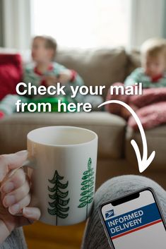 a person holding a coffee cup in their hand with the text check your mail from here