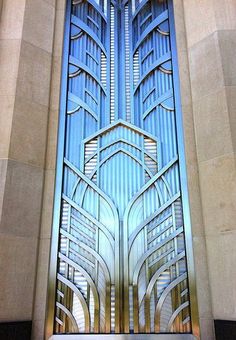 an art deco door in the middle of a building