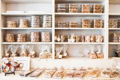 shelves filled with lots of different kinds of cookies