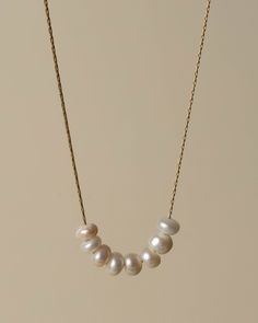 A little string of pearls on a delicate chain gives this necklaces an air of elegance without feeling overdone. Details: Fresh water pearls Stainless Steel 18K Gold Plated Waterproof, hypoallergenic, anti-fading Fresh Water Pearl Necklace, Water Pearl Necklace, String Of Pearls, Fresh Water Pearls, Waterproof Jewelry, Book Candle, Delicate Chain, Water Pearls, Freshwater Pearl Necklaces