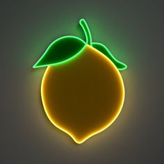 a neon sign with a green leaf on it's side and an orange in the background