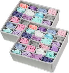 two boxes filled with lots of different colored ties