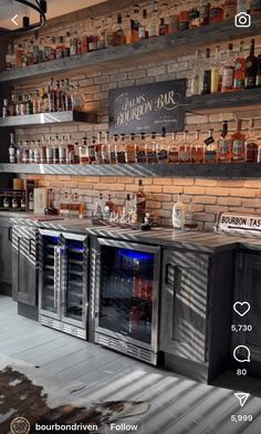 an image of a bar with liquor bottles on the shelves and behind it is a brick wall