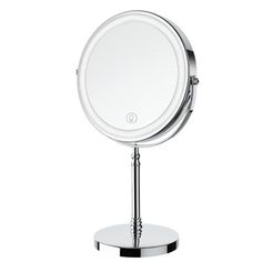 a round mirror on a metal stand