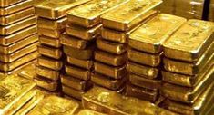 stacks of gold bars stacked on top of each other