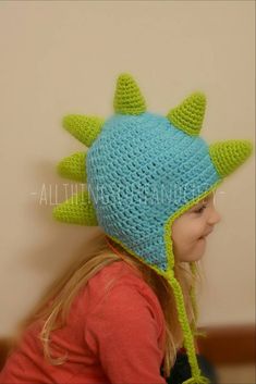 RAWR!  All dinosaur lovers will go crazy for this hat ! Made with  soft yarn, it not only looks cute but will keep your head warm all winter long!  This is perfect for birthday presents, Christmas presents, baby showers and even Halloween costumes ! You can choose any two colors to make this completely your own, Just let me know at check out. This hat is available in *Newborn (up to 2 weeks old, its about 13.5inches) *0-3 Months (14.5inches) *3-6 Months 15.5 inches *6-9 Months 16.5 inches *9-12 Toddler Crazy Hat, Diy Winter Clothes, Crochet Dinosaur Hat, Baby Boy Crochet, Dragon Hats, Dinosaur Hat, Tying Knots, Earflap Beanie, Boy Crochet