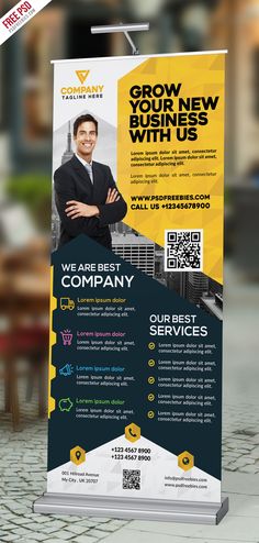 a roll up banner with an image of a man in business attire on the front