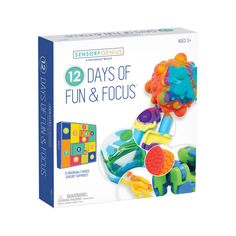 12 days of fun and focus book with toys in the box on a white background