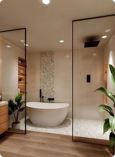 a bathroom with a large bathtub next to a plant in the middle of it