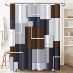 a shower curtain with an abstract design in brown and grey colors on the outside wall