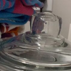 a close up of a glass jar on a table