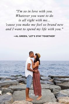 a man and woman kissing on the rocks by the ocean with a quote from frank shanata