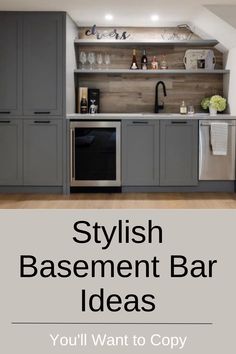 an image of a kitchen with gray cabinets and stainless steel appliances, the words stylish basement bar ideas you'll want to copy