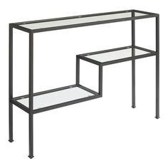 a glass and metal console table with two shelves on each side, against a white background