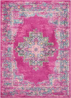 a pink area rug with an ornate design on the top and bottom, in various colors