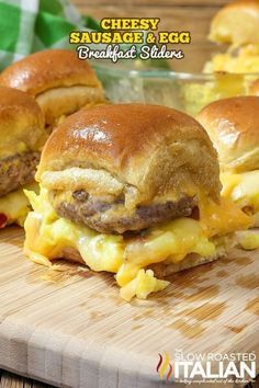 cheeseburger and egg breakfast sliders on a cutting board