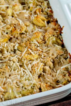 a casserole dish filled with broccoli and cheese