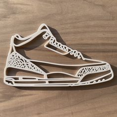 This Jordan Air 3 inspired silhouette of the iconic shoe is a must have for every sneaker head. A Perfect gift for everybody that loves and collects sneakers. 3D printed with bio degradable PLA. Available in a rainbow of colors. Size is approximately 10 in x 5.5 in (25.5cm x 15cm) Listing is for one sneaker wall art piece, actual shoes not included. Colors may vary due to monitor settings. Nike Shoe Wall Print, Nike Air Force 1 Cake Template, Air Jordan Nike Mural, Shoe Template Printable Nike, Custom Nike Sign, Nike Gift For Him, Floating Shoe Shelves Jordans, Shoe Art Wall, Nike Air Svg File Free