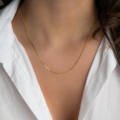 "Delicate and minimalist chain necklace is great for layering or for a sweet dainty look! - - - D E T A I L S  - - - * Made of 925 Sterling Silver * THICK plating of 14k Gold or Rhodium for a piece that will be with you for years to come! * 16\" + 3\" Ext Chain * Nickel-free & Hypoallergenic  * Lobster Clasp Closure Necklace on Model: https://www.etsy.com/listing/1332041487/medallion-necklace-dainty-necklace-gold?click_key=88a29a52c4357bc8f6512d4d5a2b9a945ae105c4%3A1332041487&click_sum=1440b153&ga_search_query=medallion&ref=shop_items_search_2&pro=1&frs=1&sts=1 Made with 100% Pure Love! ♡ Happy to answer any questions you may have! 🥰 Let's Connect! 🥰 IG: samijewels_" Simple Yellow Gold Chain Necklace, Minimalist Chain Necklace With Delicate Chain For Layering, Minimalist Snake Chain Charm Necklace For Everyday, Simple Charm Necklace With Delicate Chain, Minimalist Charm Necklaces With Delicate Chain, Minimalist Delicate Link Chain Necklace, Everyday Delicate Chain Necklace, Minimalist Delicate Chain Charm Necklaces For Layering, Minimalist Box Chain Charm Necklaces For Everyday