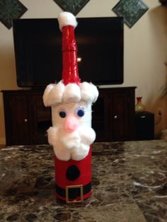 a santa clause bottle sitting on top of a counter