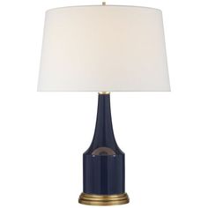 a blue table lamp with a white shade