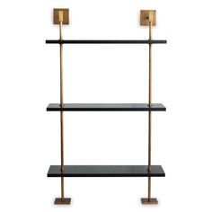 a black and gold shelf with three shelves