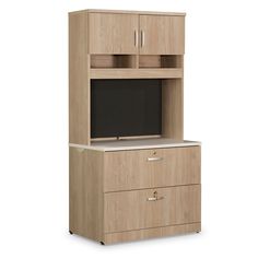 an office cabinet with a television on top and two drawers underneath the cupboards is shown