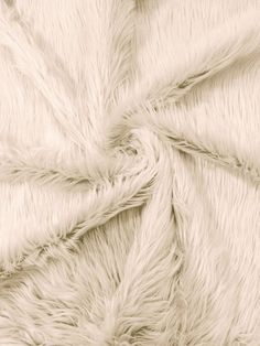 an image of a white fur texture that looks like it has been made into a blanket