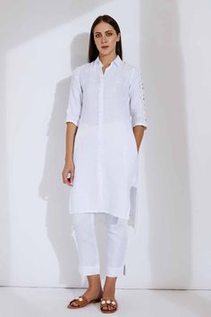 Super relaxed, soft as a feather, and incredibly glamorous - the Alora Linen kurta is an absolute dream and you'll look like one too when you step out wearing it! Made with linen/lace, it comes in white or maroon and features lace patches from shoulder to sleeve. The buttons are woven with crochet. The Alora LInen kurta radiates an ethereal appeal while ensuring you stay comfortable as ever! Model : Eduarda Height : 5Ft 8in  Wearing : XS Size Dress Fabric : 100% Linen Characteristics of Linen :  Hygroscopic All Natural UV Protection Kind On Skin Naturally Breathable Strong Improves With Age Handmade With Love In India By Yell Retail India. Price is Inclusive of All taxes. Linen Jacket, Linen Clothes, Pure Linen, Dress Fabric, Womens Clothing Tops, Fashion Inspo Outfits, Fashion Inspo, Tops & Tees, India