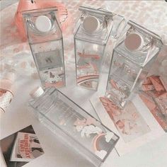 four clear boxes with different designs on them