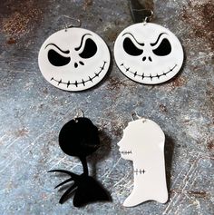 "Inspired Fan Art Nightmare B4 X-Mas Dangle Earrings! Jacks Classic Smirk is dual layer cuts from 1.5mm acrylic (total thickness 3mm). These beautiful earrings are 2.5\" round with a 1/2\" drop. The Jack and Sally Silhouettes are a pair of lovers for each ear. Cut from lightweight 1.5 mm acrylic, at 2.5\" long with a 1/2\" drop. Perfect for any NBC Lover! Set with Nickle Free Earring Hooks." Halloween Jewellery, Art Earrings, Earring Ideas, Jack And Sally, Free Earrings, Halloween Earrings, Halloween Jewelry, Christmas Earrings, Layered Cuts