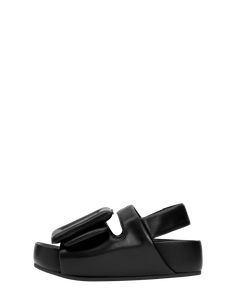 Oversized puffy buckle and belt platform slingback sandal. Lambskin upper and insole. Rubber sole. Leather Slip-on Sport Sandals For Streetwear, Black Slip-on Sport Sandals For Streetwear, Black Buckle Closure Sandals For Streetwear, Luxury Rubber Sole Slip-on Slides, Boyy Bag, Black Buckle Closure Slip-on Sandals, Slingback Sandal, Travel Case, Handbag Accessories