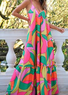 -Bold Print -Spaghetti Strap Maxi Dress -Loose and Flowy Fit -Ruffle Detail -Adjustable Straps -Fits True to size. Model is wearing a size small; she wears a 3. Size Chart Small Medium Large Bust 34 36 38 Waist 26 28 30 High Hip 34 36 38 Low Hip 37 39 41 **in inches** Suspenders Fashion, فستان زهري, Bohemian Floral Dress, Mode Prints, Cami Maxi Dress, Colorful Dress, Printed Halter Dress, Spaghetti Strap Maxi Dress, Boho Geometric