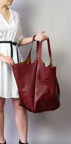 "Oversized bag - large leather tote bag More colors: Cognac: https://www.etsy.com/listing/625890963/large-leather-tote-bag-slouchy-tote?ref=shop_home_active_1 Black: https://www.etsy.com/listing/610241985/black-shoulder-bag-weekender-oversized?ref=shop_home_active_11 Green: https://www.etsy.com/listing/613035173/large-shoulder-bag-large-hobo-bag?ref=shop_home_active_48 Light grey: https://www.etsy.com/listing/608115939/large-leather-tote-bag-light-grey?ref=shop_home_active_47 Brown: https://www. Slouchy Tote Bag, Slouchy Tote, Large Hobo Bag, Large Leather Tote Bag, Soft Leather Bag, Stylish Tote Bag, Oversized Bag, Oversized Tote Bag, Handbag For Women