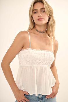 Solid crepe cami top. Smocked lace bodice with ruffle. Straight neckline with scalloped lace. Sleeveless adjustable cami straps. Low, smocked back with lace ruffle. High empire waist. Flared hem. Babydoll silhouette. Partial lining. Relaxed fit. 100% Rayon. Imported. Designed in LA. Babydoll Cami Top, Babydoll Cami, Soul Mate, Lace Babydoll, Straight Neckline, Lace Ruffle, Lace Bodice, Flowy Tops, Boho Look