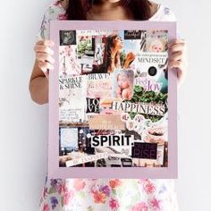 a woman holding up a poster with pictures on it