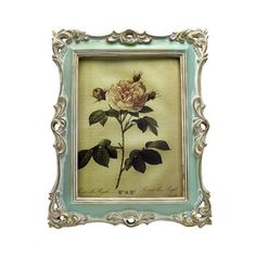 an old fashioned frame with a painting of a flower on the front and side of it