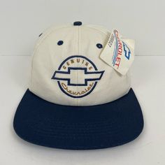 Vintage Genuine Chevrolet Deadstock Snapback K Products Hat. Item Condition: New With Tags, Deadstock. Item Comes From A Smoke And Pet Free Environment. Please Consider Pictures As Part Of The Description And Ask Any Questions Prior To Purchasing. Vintage White Baseball Cap With Curved Brim, Vintage White Flat Brim Hat, Retro Adjustable White Baseball Cap, White Vintage Snapback Hat, Vintage White Baseball Cap, White Adjustable Retro Hats, Vintage White Cotton Trucker Hat, Retro White Visor Hat, Vintage White Cotton Snapback Hat