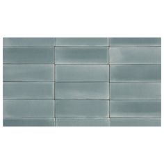 the back side of a gray tile wall