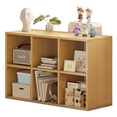 a wooden shelf filled with books and figurines